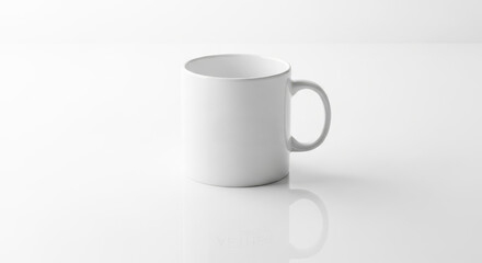 Simple white ceramic mug with handle isolated on white background