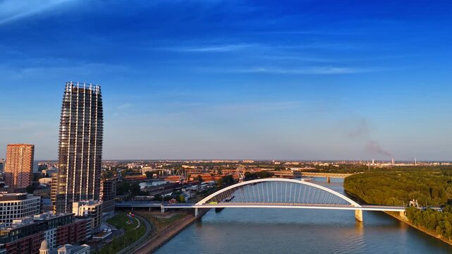 The Appolo Bridge over the Danube in Bratislava, Slovakia. Modern scenery of the city at sunset time.