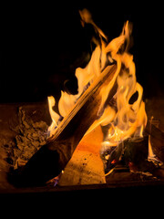burning firewood in the fireplace