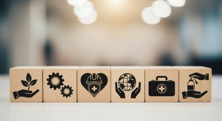 Row of wooden blocks with icons representing sustainability, industry, health, global care, safety, and hygiene, symbolizing corporate social responsibility