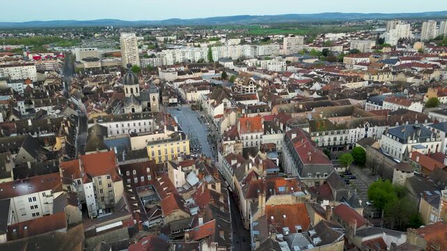 Aerial view of the terracotta rooftops and the Chalon Cathedral dome under a soft morning light creating a stunning contrast, Chalon-sur-Sa&ocirc;ne, France.