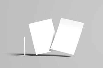 Two paper invitation cards on trendy grey background with copy space for pen design presentation
