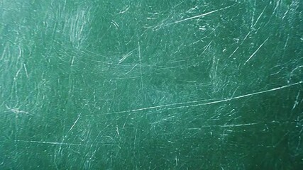 Empty green chalkboard and wooden desk in classroom setting - Powered by Adobe