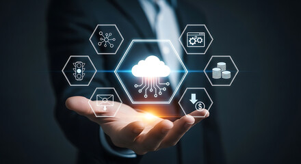 Businessman holding a glowing cloud computing network with various digital icons in his palm