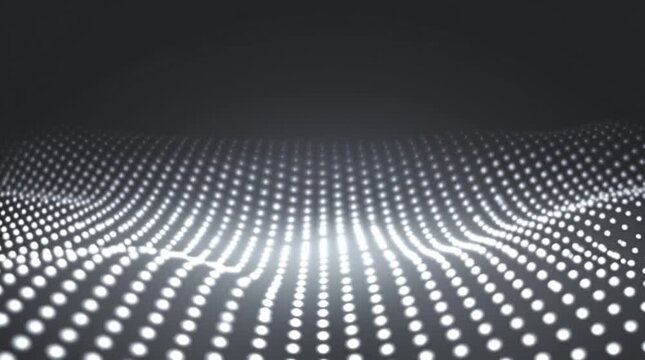 Perfect grid of small white dots on a dark grey background, softly pulsing in a rhythmic pattern. Gentle waves of light move across the grid, creating a calm, modern, and hypnotic abstract visual.
