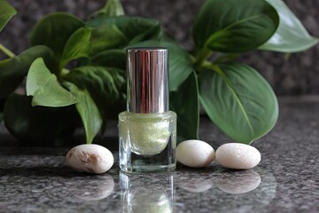 Elegant nail polish bottle with natural elements.