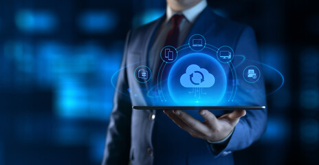Businessman Holding tablet with Cloud Computing Icons on Screen. Data transfer and Cloud Backup...