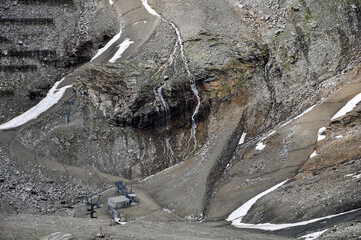 snowless mountains with a ski lift