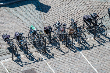 Parked bikes standing on the Grote Markt in Veurne, West Flemish Region, Belgium