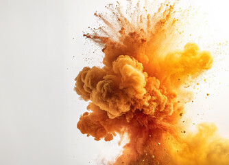 Vibrant orange and yellow powder explosion with dynamic smoke and particles in mid-air creating a dramatic visual impact on a light background