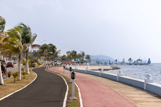 Afternoon view of the walkway malecón waterfront along the Gulf of Mexico in Campeche, Mexico. 