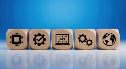 Wooden cubes show chip, gears, API, and globe symbols, representing technology, development, and global connections.