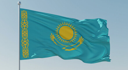 The flag of Kazakhstan fluttering calmly in the morning wind, isolated against a pastel blue sky.