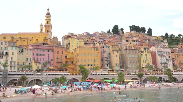 Menton France French Riviera Beach City Wide View. Tourism Sign Colorful Buildings Summer in Southern France Les Sablettes Beach Cote d'Azur