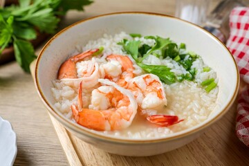 Rice porridge with shrimp ,home made rice soup with shrimp in a ceramic bowl