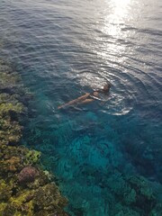 Woman snorkeling in the sea