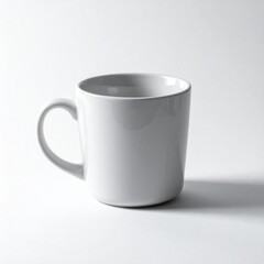 Fototapeta premium Clean White Ceramic Mug on a Plain White Surface in Bright Studio Lighting