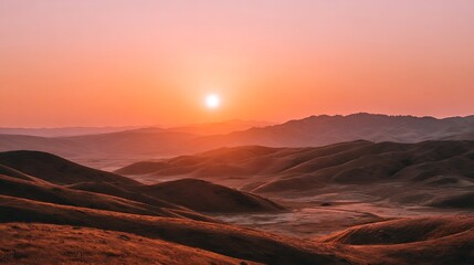 Naklejka premium Awesome photo of pink And Orange Sunset Over Rolling Hills Silhouette.