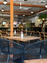 Cozy Modern Cafe Interior with Wooden Tables and Minimal Decor