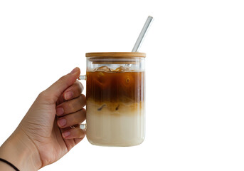 Hand holding a glass of iced coffee with a straw and wooden lid against a plain backdrop view close up on transparent background
