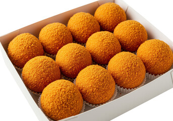 A box filled with a dozen orange colored dessert balls arranged neatly in a white container for serving on transparent background