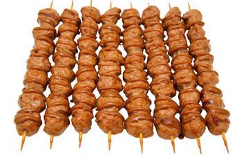 Rows of delicious looking meat skewers with sauce drizzled on top, ready to be eaten and enjoyed now on transparent background
