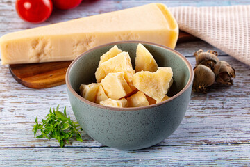 Parmesan cheese pieces in the bowl