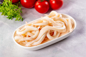 Canned marinated squid rings heap