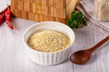 Raw dry sesame seeds heap