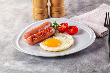 Breakfast with egg and sausages