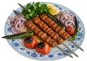 Close up of three skewers of ground meat served with grilled vegetables on a patterned plate on transparent background