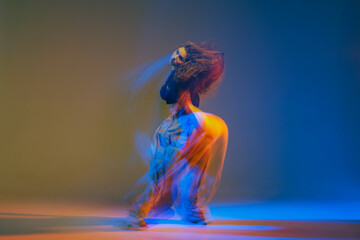 Vibrant Jazz Funk Dancer in Motion with Colorful Lighting Modern Urban Dance and Choreography