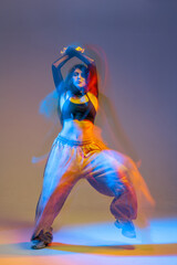 Jazz Funk Dance Performer in Motion with Colorful Lighting Modern Urban Energetic Choreography