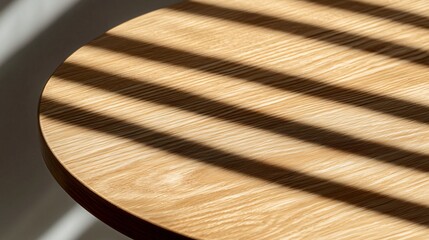 gentle daylight shadows illuminating a close-up of an empty wooden table