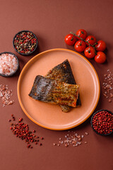 Food, seafood, grilled fish fillet with lemon, salt and spices. Grilled fish fillet