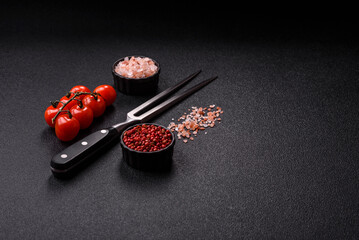 Empty meat or steak fork with vegetables, spices and other ingredients. Meat fork