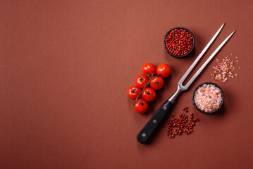 Empty meat or steak fork with vegetables, spices and other ingredients. Meat fork