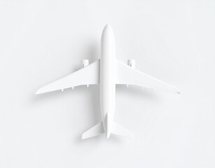 Minimalist White Airplane Model Isolated on White Background Top Down View