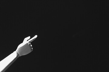 robotic hand, pointing gesture, dark background, minimalism, artificial intelligence, technology...