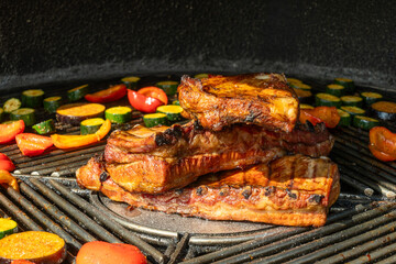 Grilled Pork Ribs And Vegetables On Barbecue. Summer Barbecue Scene With Juicy Pork Ribs And Colorful Grilled Vegetables Outdoor Cooking And Picnic Atmosphere.