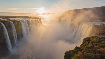 Soft focus view of waterfall blurred in distance through fog with golden backlight
