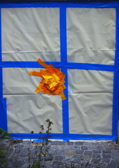 construction site, plastic sheet, blue tape, yellow tape, temporary wall, taped barrier, safety...