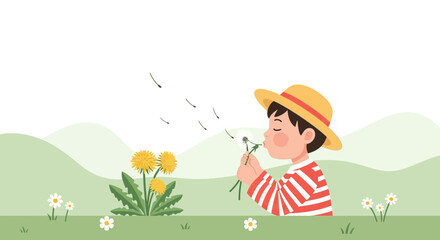 Boy With Straw Hat Blows Dandelion Seeds On a Hill On A Sunny Day