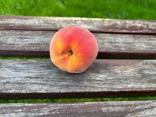 peach on a wooden table