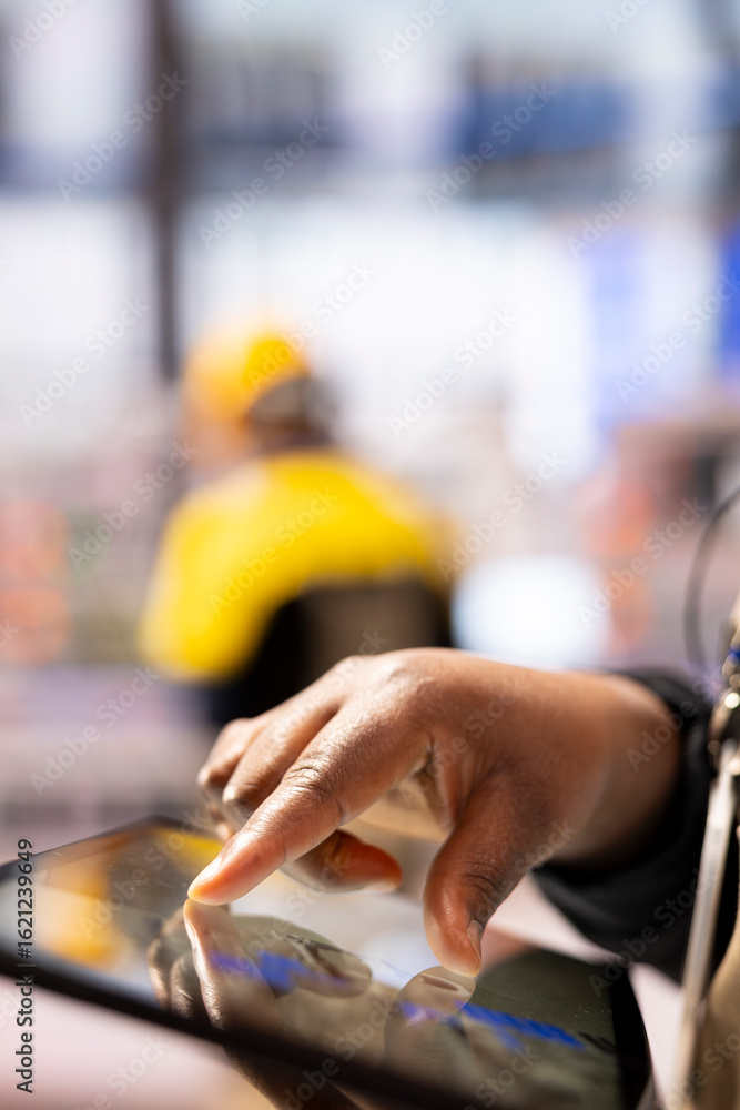 Poster smart factory engineer developing robotic machinery with cad software on tablet. closeup of technici