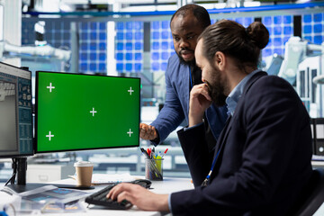 Team of consultants and factory analysts work with a copy space screen in the solar panel factory, ensuring every detail aligns with clean energy efficiency and solar technology innovation.