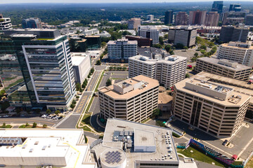 Modern City Downtown Virginia from a Drone. Skyscrapers, Roads, and Parking Lots.