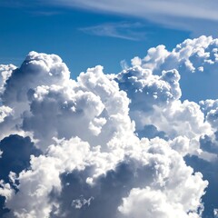 Fluffy clouds against a vibrant blue sky