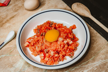 Chopped raw salmon, cooking homemade fish patties