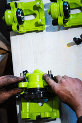 Brake Caliper Assembly. Installing heavy-duty drift brake calipers to enhance stopping power and reliability. Bright performance brake calipers getting assembled for drift-ready stopping precision.